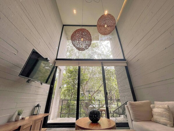 Appartement, 3 chambres | Coin séjour | Télévision à écran plat