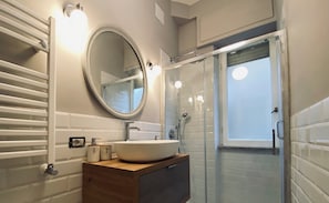 Shower, eco-friendly toiletries, hair dryer, bidet
