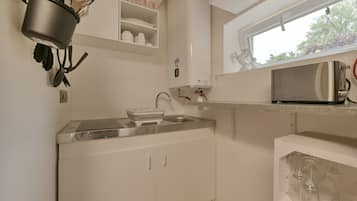 Fridge, microwave, coffee/tea maker, toaster