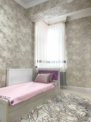 Blackout drapes, soundproofing, iron/ironing board, free WiFi