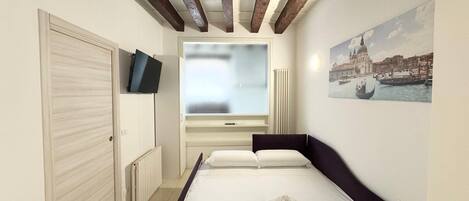 1 غرفة نوم ومكواة/لوح كي وواي فاي وملاءات أسرّة