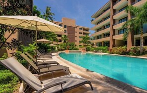 Outdoor pool, open 9:00 AM to 9:00 PM, pool umbrellas, sun loungers