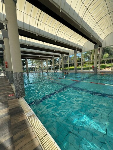 Spacious 6-bedroom apartment in serene Caesarea with fitness room, AC, pool