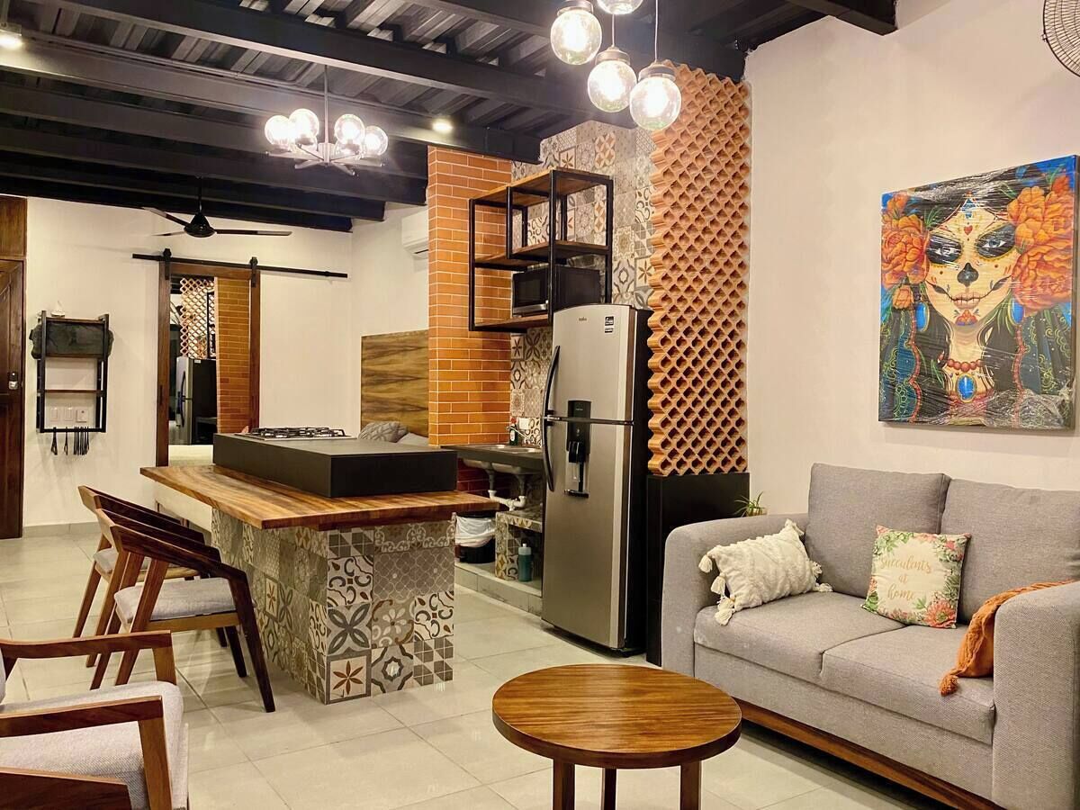 Departamento Confort, balcón, vista al mar | Área de sala de estar