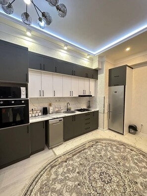 Comfort Apartment, Balcony, Garden View | Private kitchen | Coffee/tea maker, electric kettle