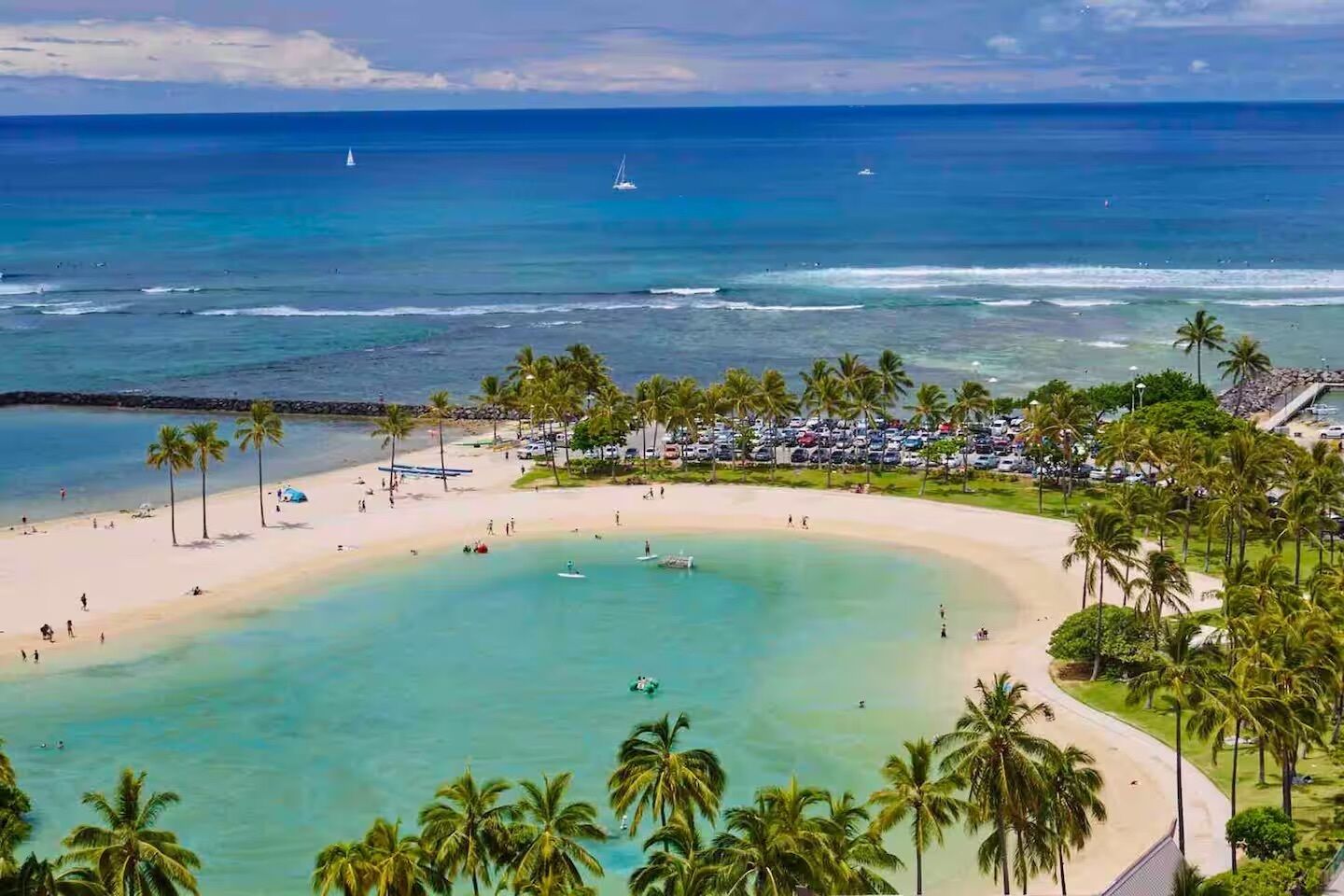 On the beach, white sand, beach umbrellas, beach towels