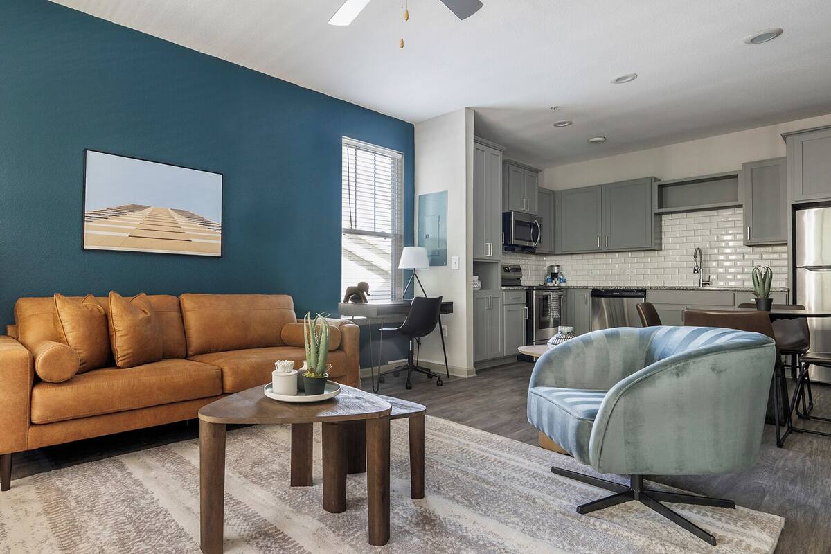 Apartment, 1 Bedroom | Living area | 50-inch TV with digital channels