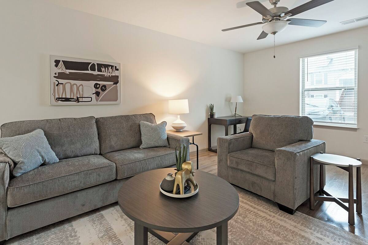 Apartment, 2 Bedrooms, 2 Bathrooms | Living area | 50-inch TV with digital channels