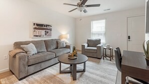 Apartment, 2 Bedrooms | Living area | 50-inch TV with digital channels
