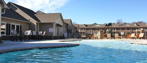 Seasonal outdoor pool, pool loungers