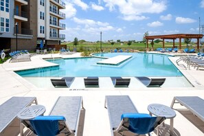 Seasonal outdoor pool, pool loungers