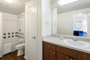 Apartment, 1 Bedroom | Bathroom | Combined shower/tub, free toiletries, hair dryer, towels - Webster Apartments By Landing (Webster)