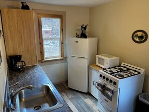 Fridge, microwave, coffee/tea maker, toaster