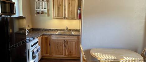 Fridge, microwave, coffee/tea maker, toaster