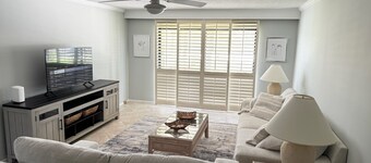 Sandy Toes & Sunrise Views: Beachside Condo