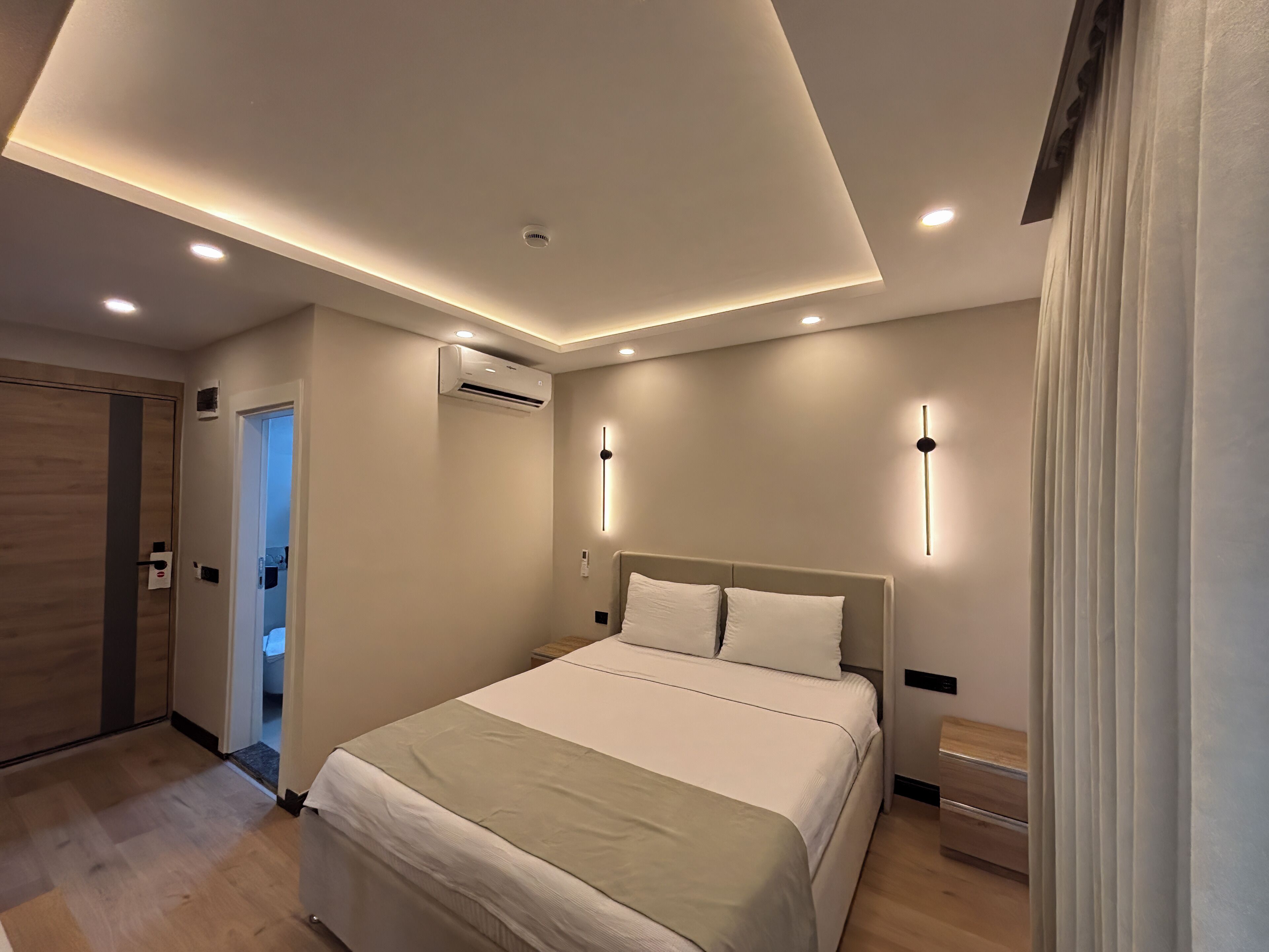 Premium bedding, desk, laptop workspace, free WiFi