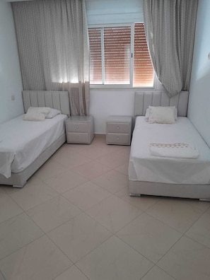 2 quartos, ferros/tábuas de passar roupa, Wi-Fi de cortesia