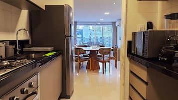 Apartment | Private kitchen | Coffee/tea maker, fridge, microwave, oven