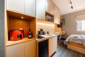 Apartment | Private kitchen | Microwave, cleaning supplies