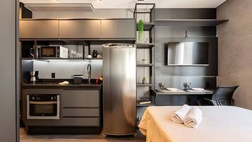 Estúdio premier | Cortinas blackout, Wi-Fi de cortesia, roupa de cama