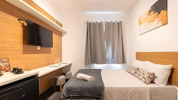 Cortinas blackout, Wi-Fi de cortesia, roupa de cama