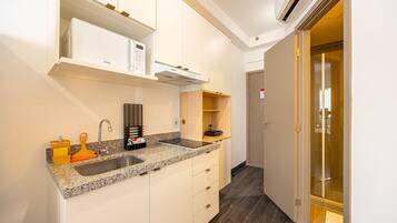 Apartamento conforto | Cozinha privada | Micro-ondas, produtos de limpeza