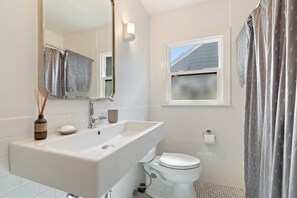 Hair dryer, towels, soap, toilet paper
