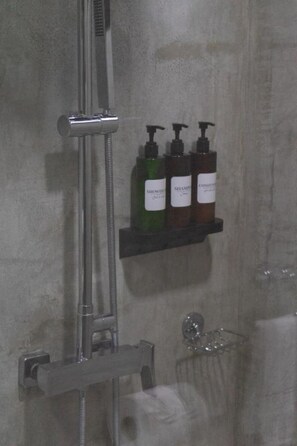 Hair dryer, towels, soap, toilet paper