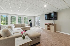 Smart TV, fireplace, video games, table football