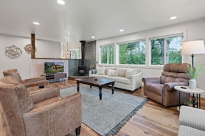 Smart TV, fireplace, table football, books