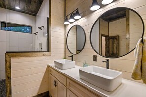 Shower, eco-friendly toiletries, hair dryer, towels
