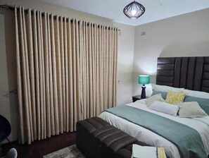 2 bedrooms, iron/ironing board, WiFi, bed sheets