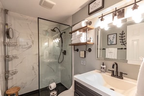 Shower, hair dryer, towels, soap