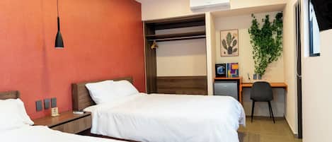 Hypo-allergenic bedding, minibar, desk, laptop workspace