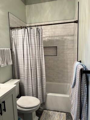 Hair dryer, towels, soap, toilet paper