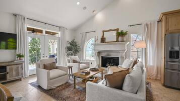 Smart TV, fireplace, books