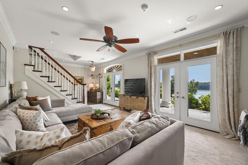 Welcome to the Banks of Aurora - A Charming River View Home in Downtown Aurora