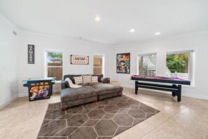 House, Multiple Beds, Patio, Garden View (220 Christmas Tree Lane) | Living area | 55-inch flat-screen TV with digital channels