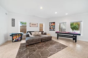 House, Multiple Beds, Patio, Garden View (220 Christmas Tree Lane) | Living area | 55-inch flat-screen TV with digital channels