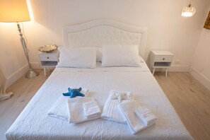 2 chambres, fer et planche à repasser, Wi-Fi, draps fournis