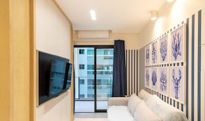 Apartment | Living area - Sua estadia exclusiva a poucos passos do Mar em Meia Praia - FFS (Itapema)