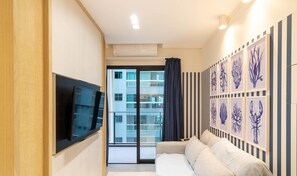 Apartment | Living area - Sua estadia exclusiva a poucos passos do Mar em Meia Praia - FFS (Itapema)