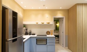 Apartment | Private kitchen - Sua estadia exclusiva a poucos passos do Mar em Meia Praia - FFS (Itapema)