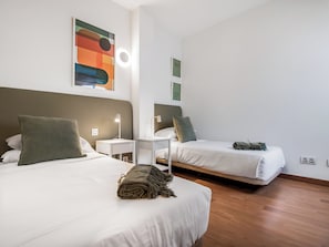 2 habitaciones y ropa de cama