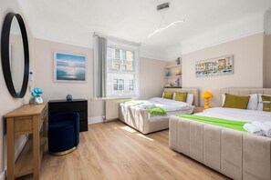 4 habitaciones, tabla de planchar con plancha, wifi y ropa de cama