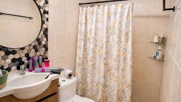 Hair dryer, towels, soap, shampoo