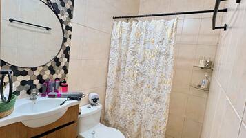 Hair dryer, towels, soap, shampoo