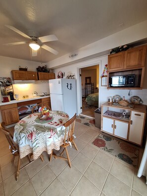 Fridge, microwave, stovetop, coffee/tea maker