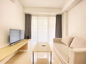 Standard Apartment | Living room - Relaxing 1Br Apartment At Landmark Residence Bandung (Bandung)