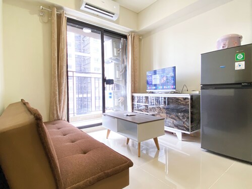 Homey And Warm 2Br At Meikarta Apartment